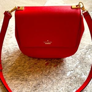 Kate Spade bright red shoulder bag.